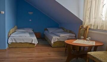 Фото номера Двухместный номер с 2 отдельными кроватями Отель Hotel Czardasz г. Вжесня 2