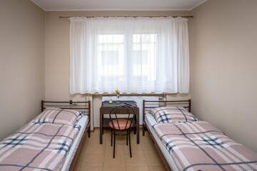Фото номера Двухместный номер с 2 отдельными кроватями и общей ванной комнатой Проживание в семье Pokoje Gościnne Arkadia г. Вжесня 3